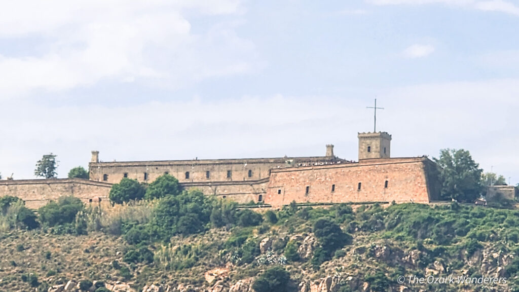 Montjuïc Castle overlooking the port of Barcelona, Spain — a 17th-century fortress that once guarded the city and now offers panoramic harbor views.